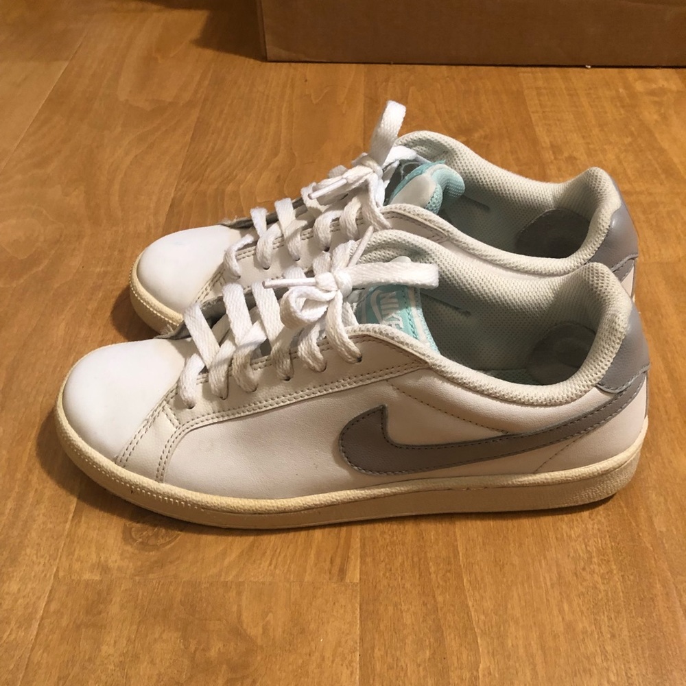 Women white Nike sneakers